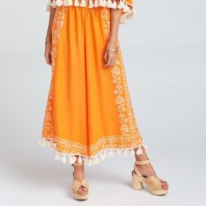 Explorer Tassel Pants in Clementine NWOT